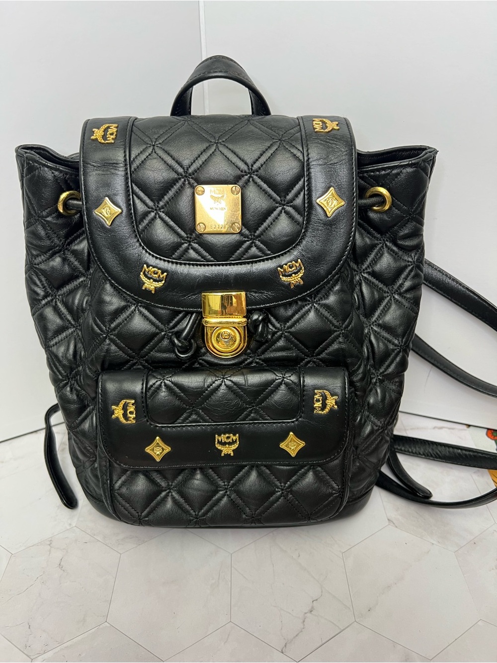 MCM Black Quilted Leather Backpack with Gold Accents